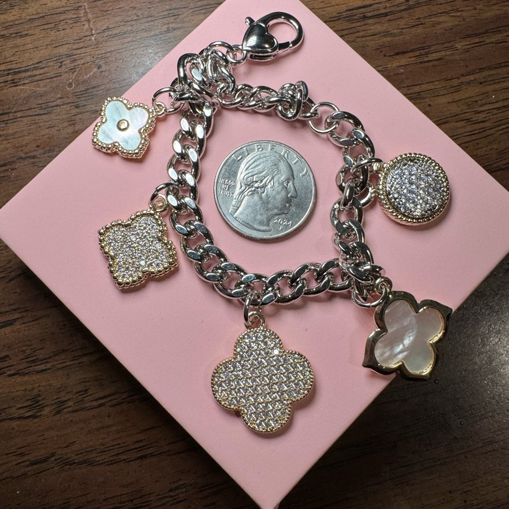 Elegant Silver and Gold Charm Bracelet